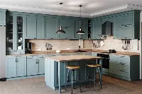Modern U-shaped kitchen cabinetry featuring a wraparound three-wall layout and a seamless, ergonomic workflow