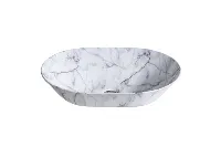 Architectural round basin with a hammered metallic surface, providing a multidimensional and industrial look