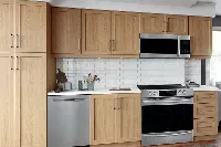 Sleek architectural cabinetry showcasing a continuous linear silhouette and a refined, minimalist aesthetic for a streamlined kitchen