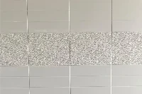 A cultured marble wall panel designed for hotel shower surrounds, suite bathroom renovations, and hospitality installations - where large-format tile aesthetics are required without the grout maintenance that real tile installations demand.