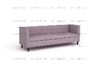 Sleek architectural sofa showcasing traditional tufting paired with a clean-lined, mid-century silhouette