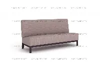 Sleek architectural seating showcasing an open-ended frame and tailored fabric upholstery for a spacious feel