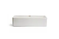 Sleek minimalist vanity with a built-in sink carved from a single continuous piece of matte stone