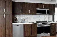 Contemporary wall-mounted cabinets with flush-front doors and a uniform, high-quality finish designed for a clutter-free look