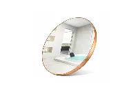 Contemporary arched vanity mirror with a minimalist frame for high-end resort ensuites
