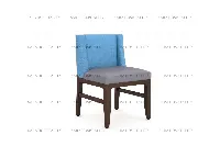 Elegant Contemporary Wood Frame Chair in a fine dining setting.