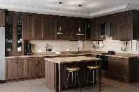 Sleek architectural kitchen showcasing continuous cabinetry along three sides for a high-efficiency, enclosed culinary space