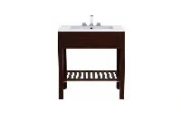 Sleek hotel-style vanity unit showcasing a geometric lattice under-sink shelf and a refined, minimalist silhouette for a textured, breezy aesthetic