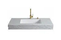 Sleek architectural counter showcasing a monolithic, handle-free design and an uninterrupted, clean-lined silhouette