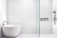 Contemporary open-concept surround unit with sturdy monolithic panels that provide an expansive, splash-proof backdrop for walk-in wet rooms