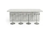 Minimalist multi-tier counter featuring contrasting material planes and a uniform, high-quality finish designed to optimize kitchen functionality