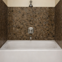 Durable full wall granite tub surround for long-lasting use