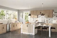 Modern open-plan kitchen cabinetry featuring a seamless integration between the culinary space and living area with a clean-lined, cohesive silhouette