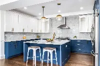 Modern kitchen island cabinet featuring a multifunctional central counter and a seamless, minimalist base with integrated storage
