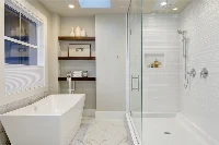 Contemporary dual-wall shower unit with sturdy monolithic panels engineered to provide high-impact moisture protection for intersecting walls