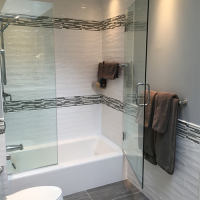 Buy quartz tub surround with sliding glass door design