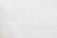Modern brick-layout panel featuring an engineered solid-surface construction and a classic running-bond pattern that grounds contemporary interior spaces