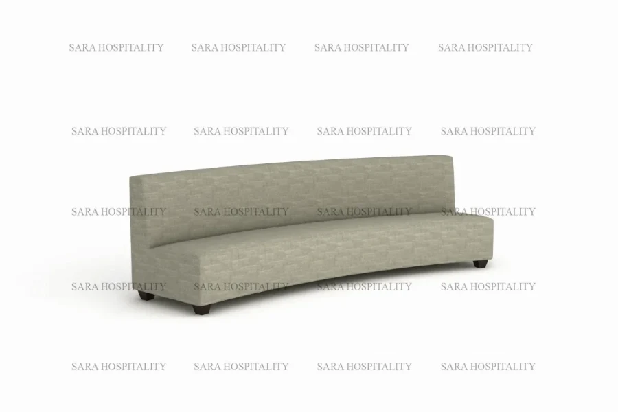 Modern curved lounge sofa featuring a fluid, organic silhouette and a plush, seamless backrest
