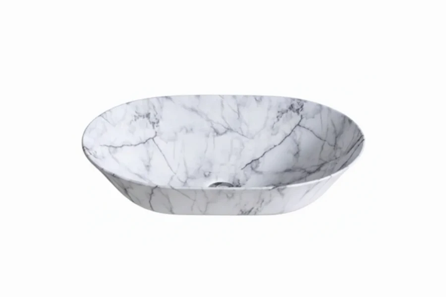 Architectural round basin with a hammered metallic surface, providing a multidimensional and industrial look