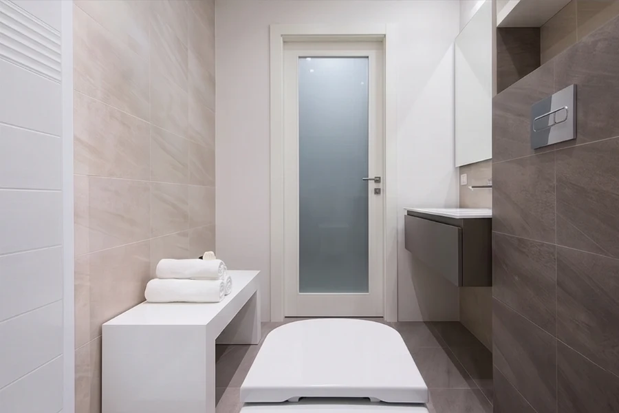 Sleek space-saving shower enclosure showcasing watertight corner panels tailored for high-use, narrow bathroom layouts