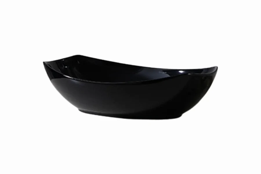 Contemporary porcelain vessel sink with a polished surface and a clean, countertop-mounted design