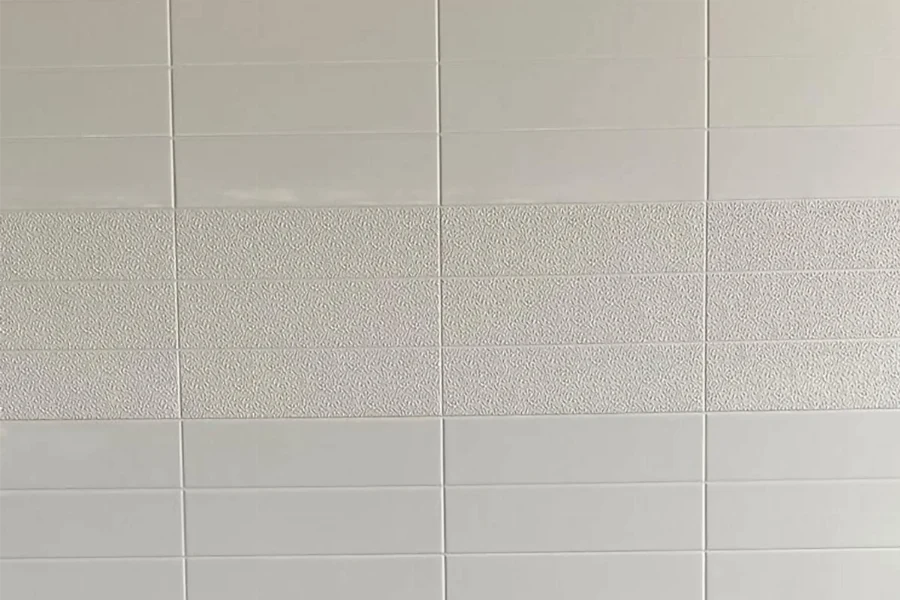 A cultured marble wall panel designed for hotel shower surrounds, suite bathroom renovations, and hospitality installations - where large-format tile aesthetics are required without the grout maintenance that real tile installations demand.