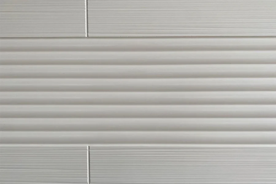 A cultured marble wall panel designed for hotel shower enclosures, boutique suite bathroom walls, and hospitality wet room installations - where a vertically ribbed surface adds tactile and visual depth to the shower wall.