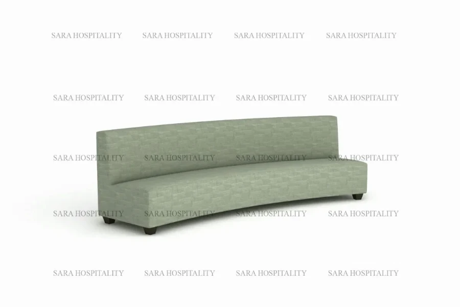 Minimalist serpentine sofa with deep, comfortable cushioning and a clean, legless aesthetic