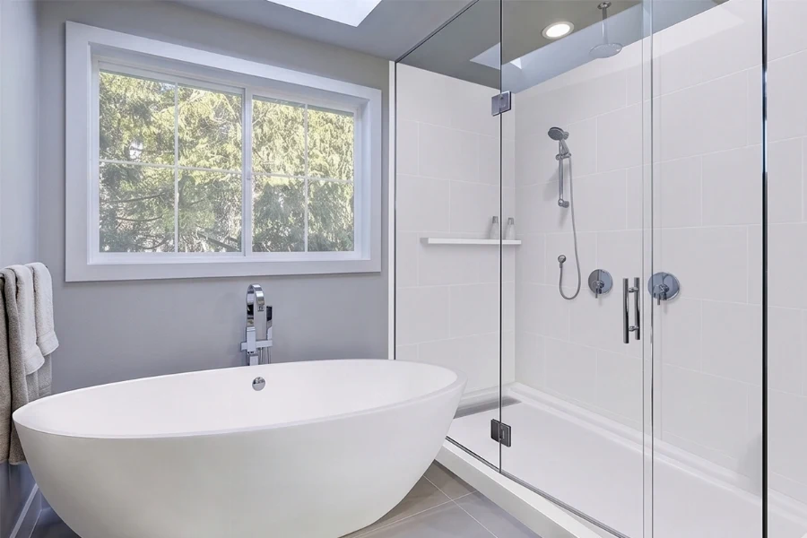 Minimalist back-to-wall surround station offering high-impact moisture protection and a clean backdrop for exposed luxury plumbing