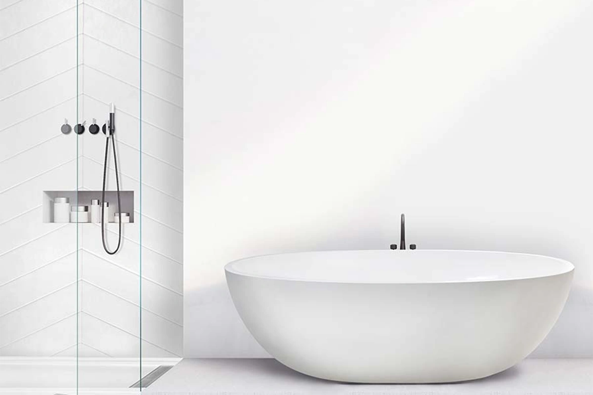 Modern open-basin surround featuring high-walled solid-surface panels engineered to pair seamlessly with low-profile, barrier-free floor basins