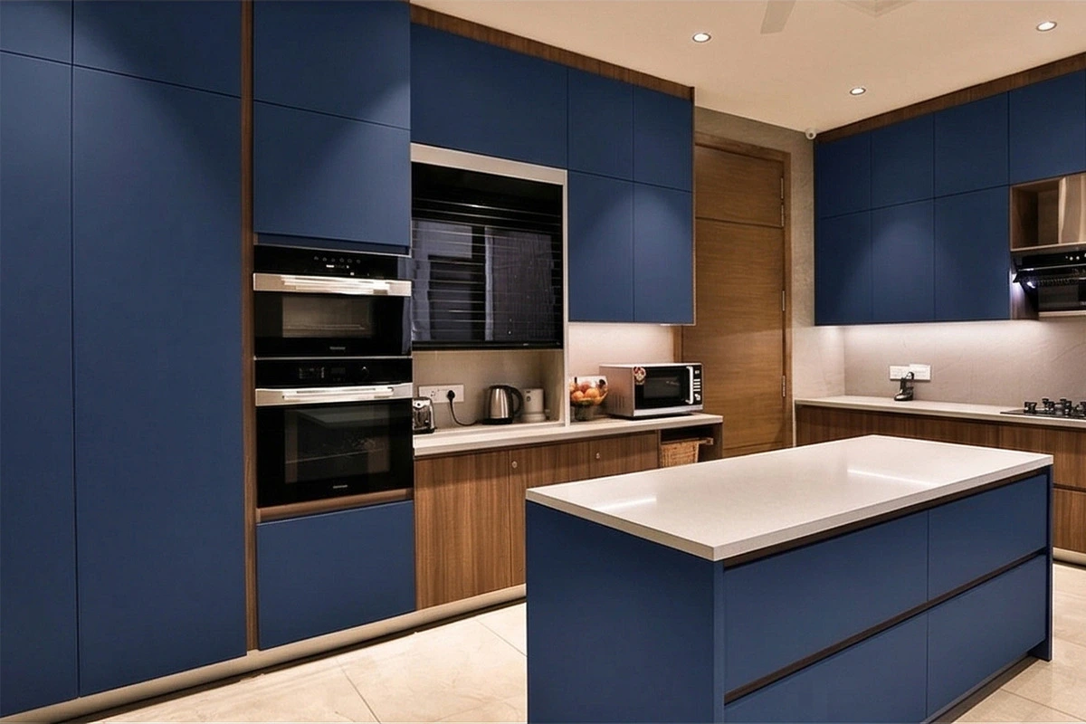 Contemporary integrated kitchen unit with flush-front doors and a minimalist, monolithic silhouette for a streamlined aesthetic