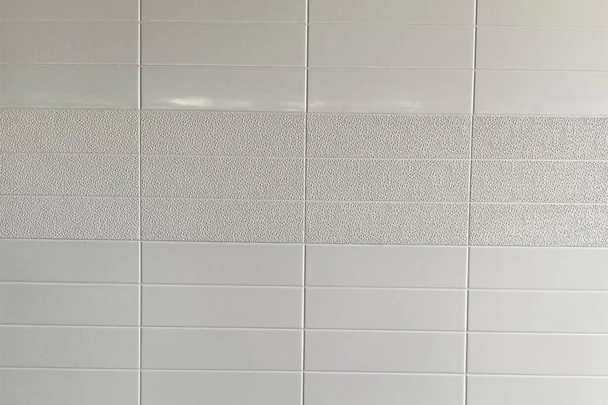 Modern dual-tone panel featuring an engineered solid-surface construction and a striking, multi-layered color block that anchors contemporary interior spaces