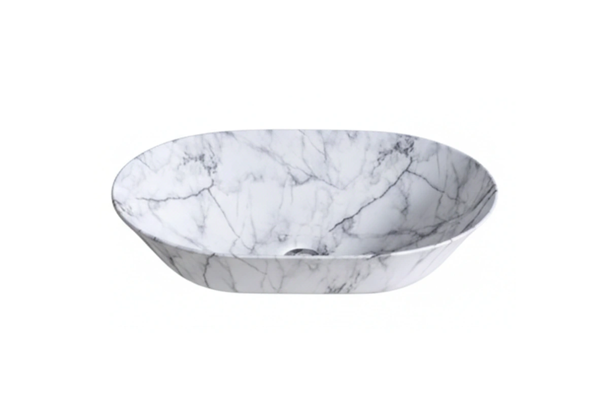Architectural round basin with a hammered metallic surface, providing a multidimensional and industrial look