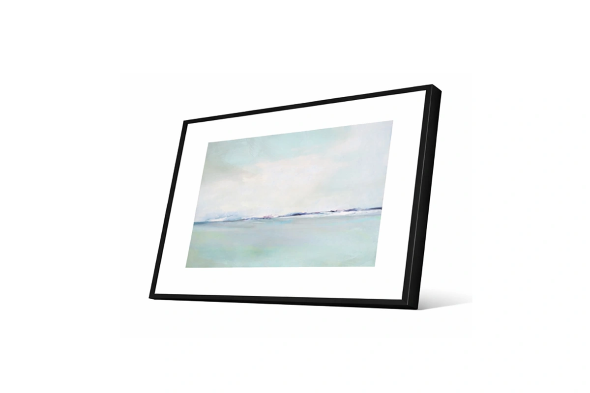 Contemporary beach scene with a wide-angle view of gentle tides and a clear, peaceful sky
