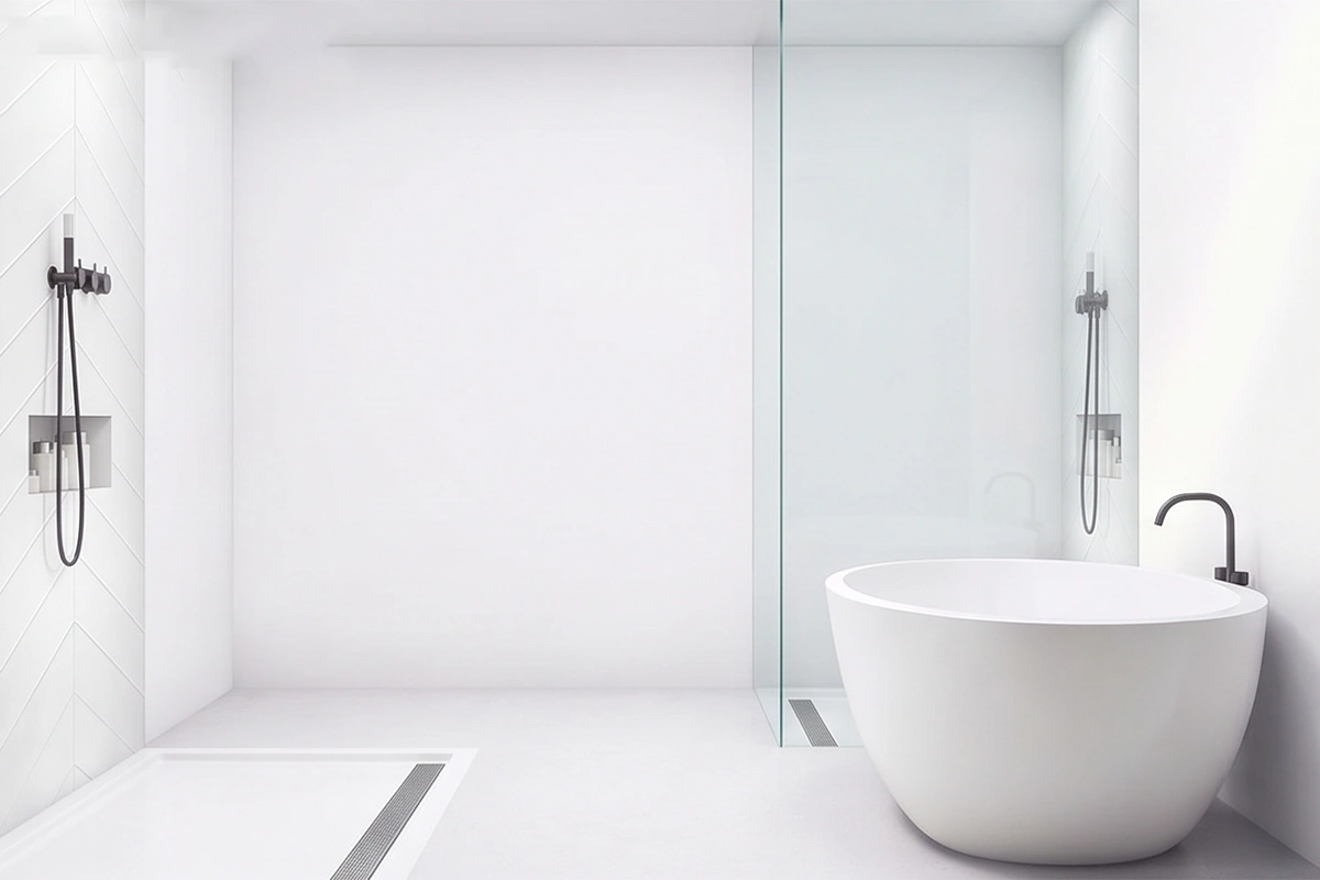 Minimalist zero-threshold surround station offering complete heavy-duty moisture protection and an uninterrupted transition to the basin floor