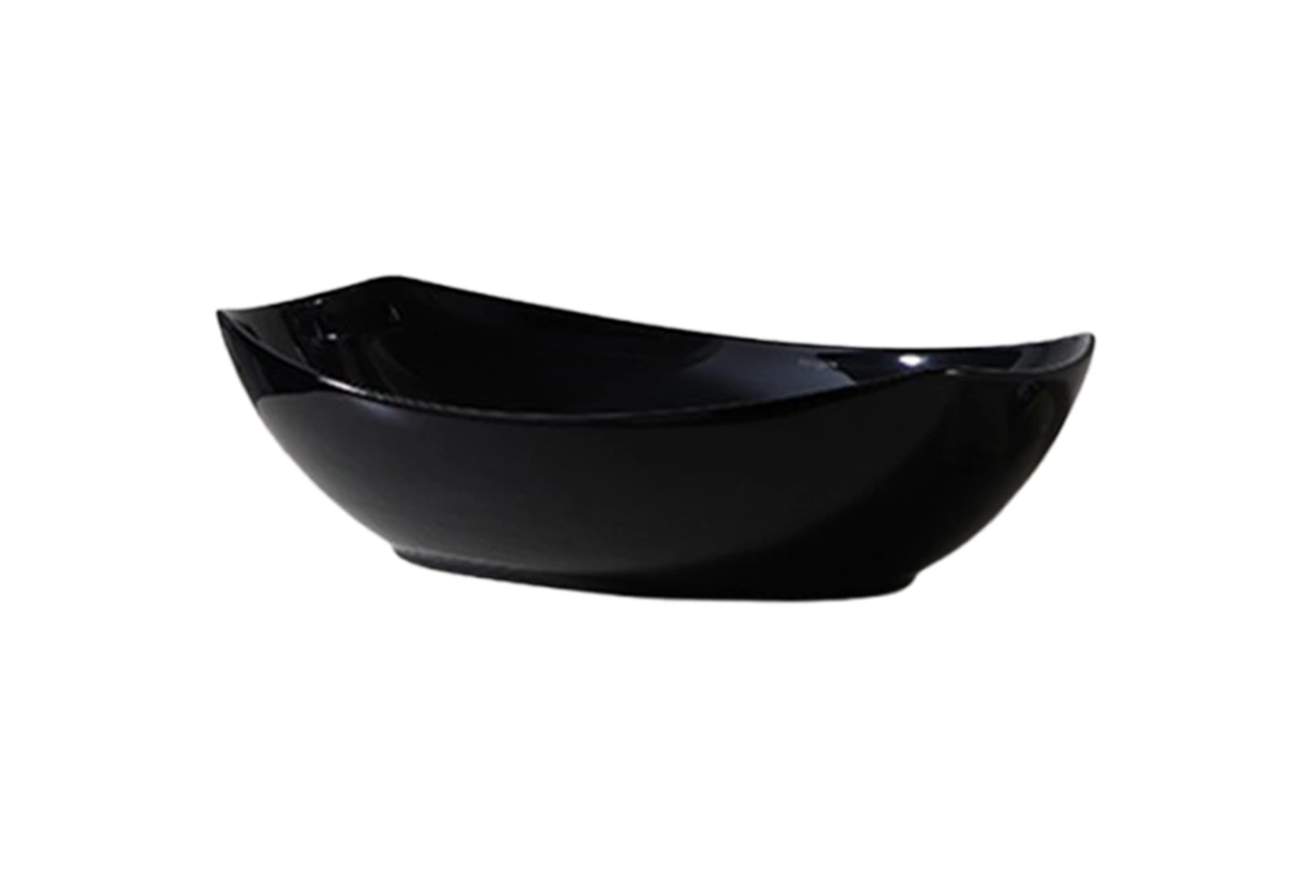 Contemporary porcelain vessel sink with a polished surface and a clean, countertop-mounted design