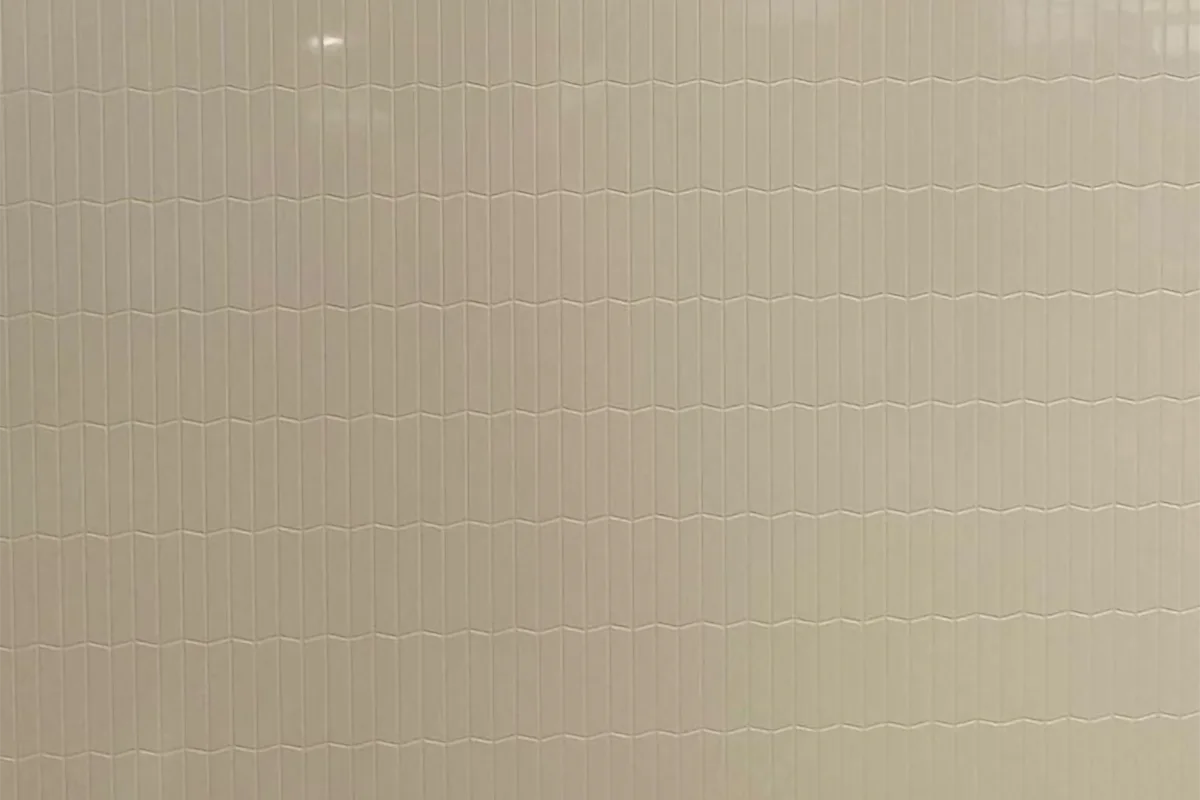 Modern smooth matte panel featuring an engineered solid-surface construction and a velvety, non-reflective finish that softens contemporary interior spaces