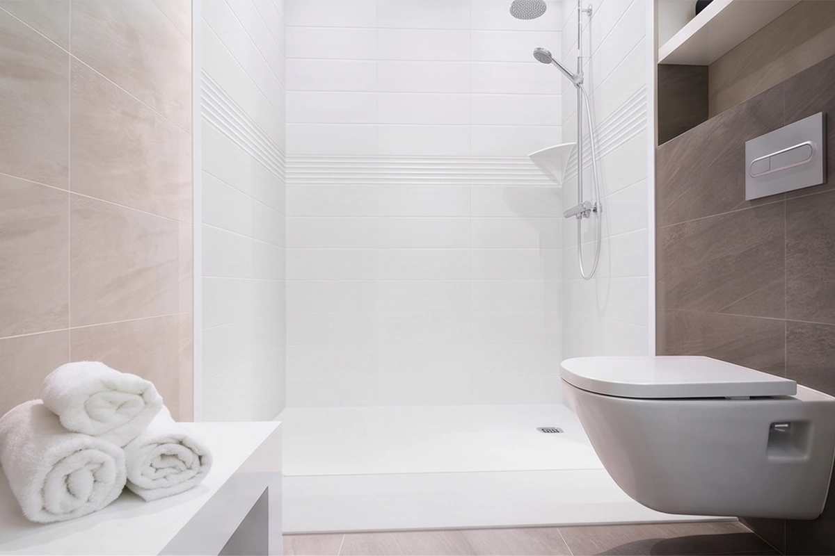 Contemporary low-profile surround unit with clean monolithic walls and a durable, scratch-resistant geometric silhouette