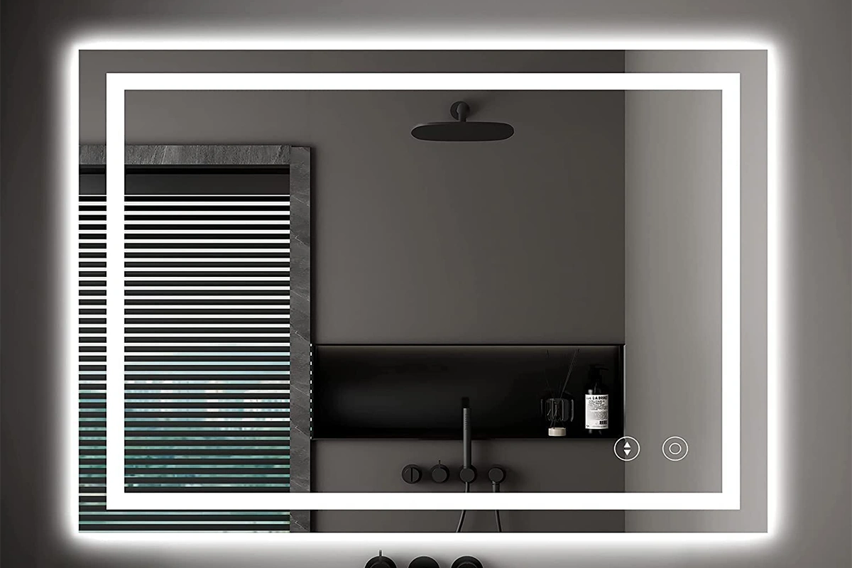 Modern rectangular backlit mirror with integrated LED glow for luxury hotel baths