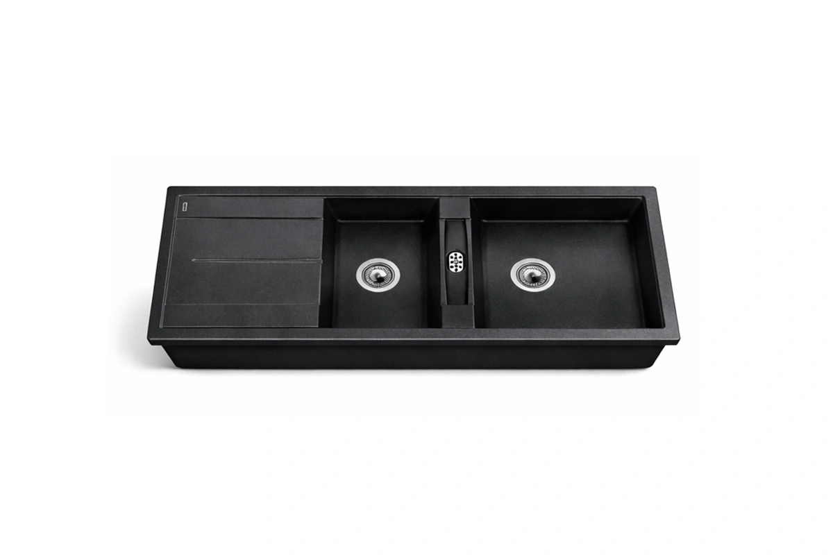 Contemporary drop-in double sink with a durable matte black finish and integrated drainboard
