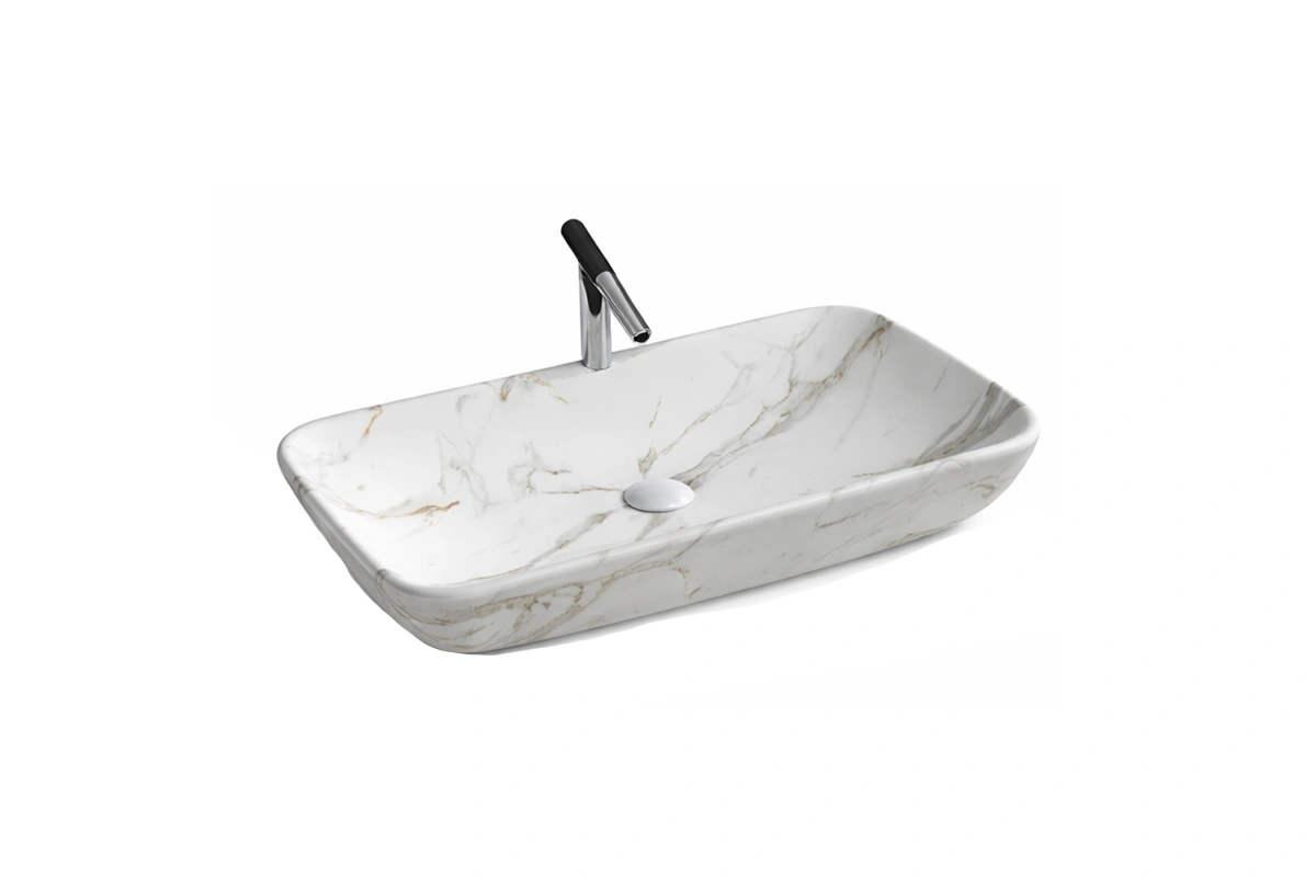 Minimalist bathroom basin with a sharp rectangular profile and a gradual, ramp-style bottom