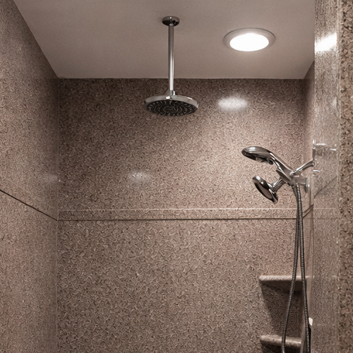 High-end granite shower surround with built-in seating design
