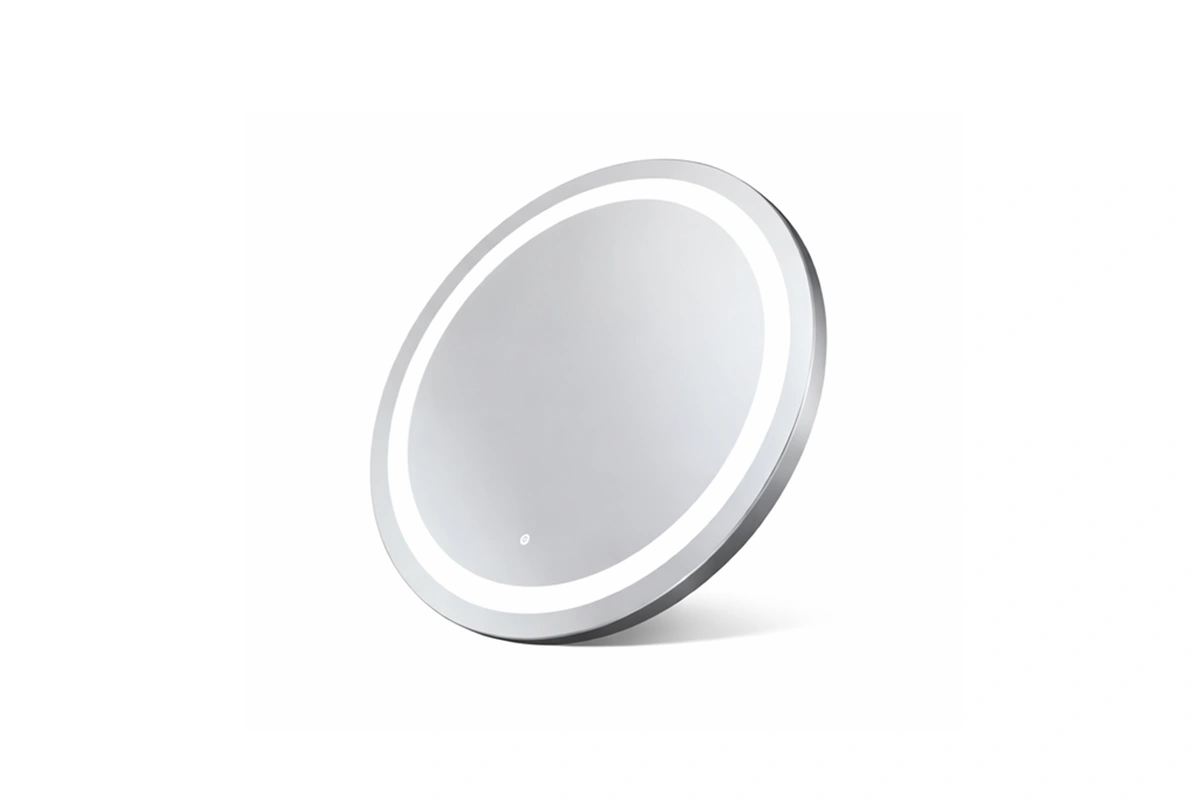 Elegant circular LED mirror with a soft perimeter glow for high-end guest room ensuites