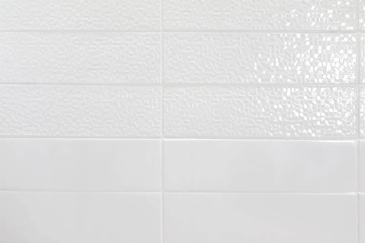 Modern subtle texture panel featuring an engineered solid-surface construction and a delicate, low-profile finish that softens contemporary interior spaces