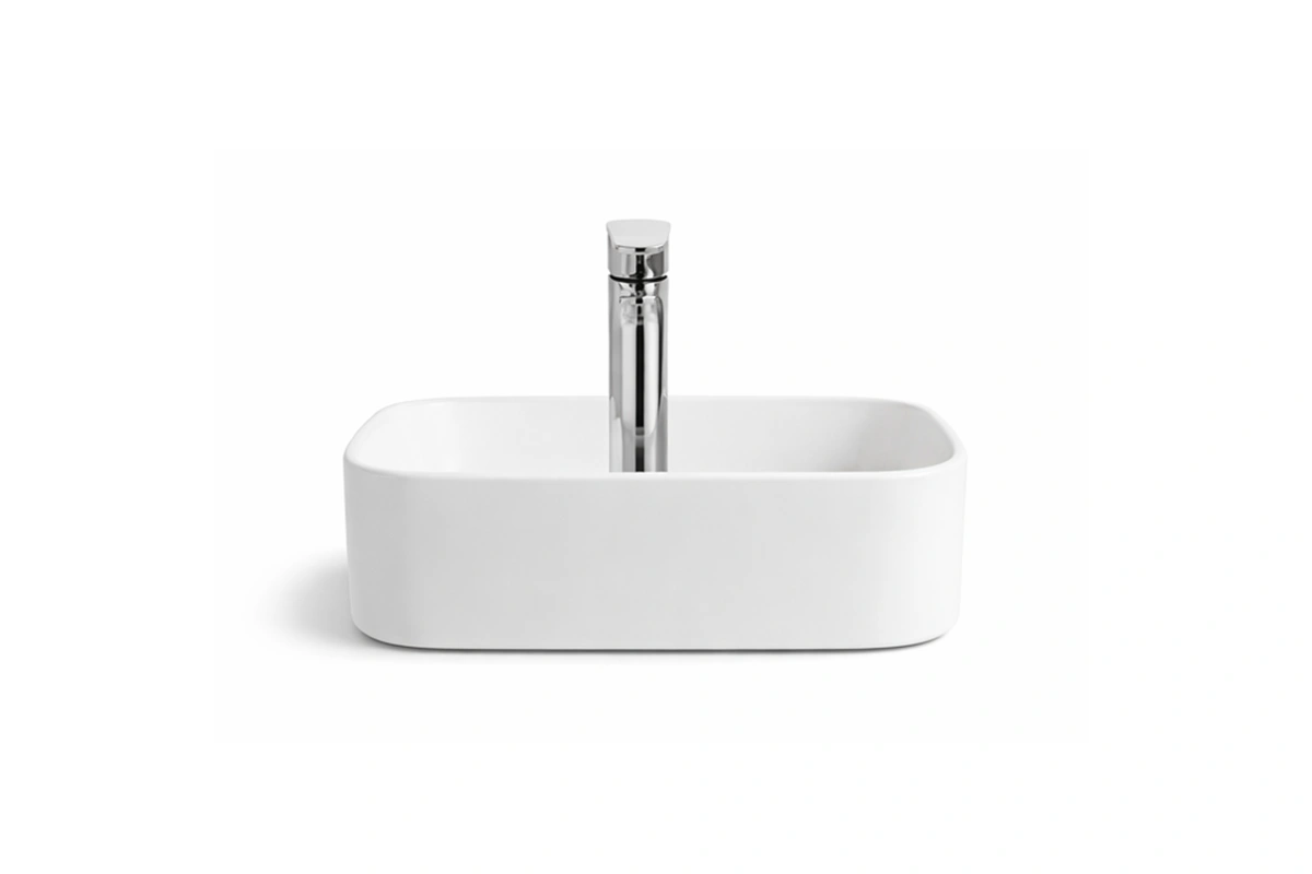 Architectural soft-edge square sink providing a clean, minimalist look with a comfortable, ergonomic fee