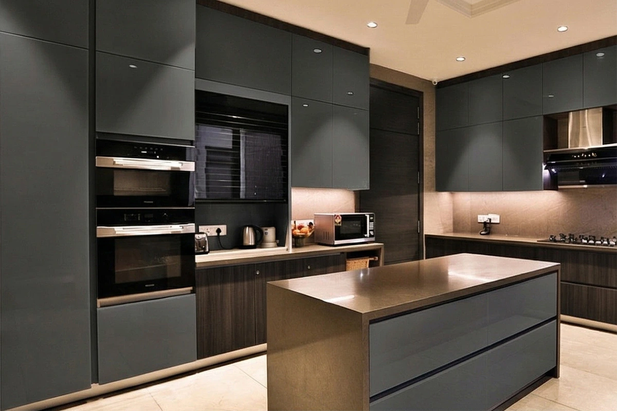 Sleek architectural cabinet system showcasing a continuous, handle-free facade that conceals major kitchen appliances